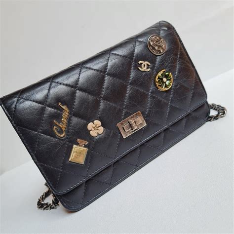 chanel black lucky charm wallet.